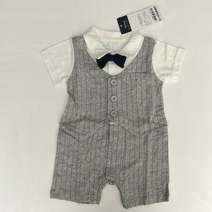 One piece onesie suit in gray and white.